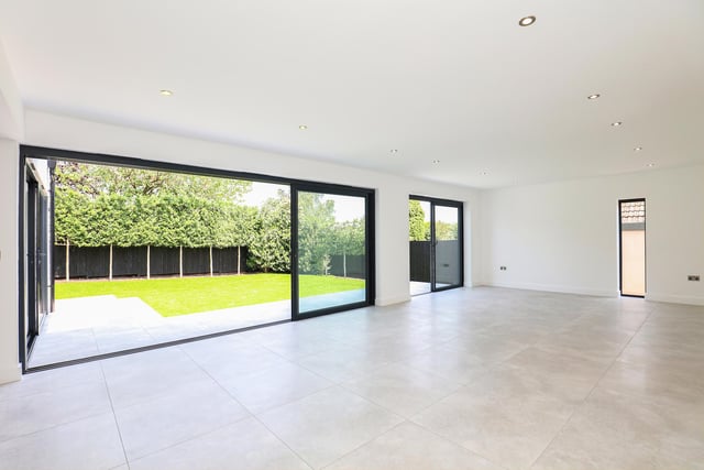 The living/dining space has enormous bi-fold doors to the garden.