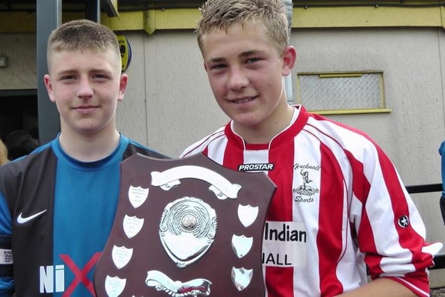 Tyler Stafford and Aaron Bradley are pictured with the Hucknall Warriors' Charity Shield.