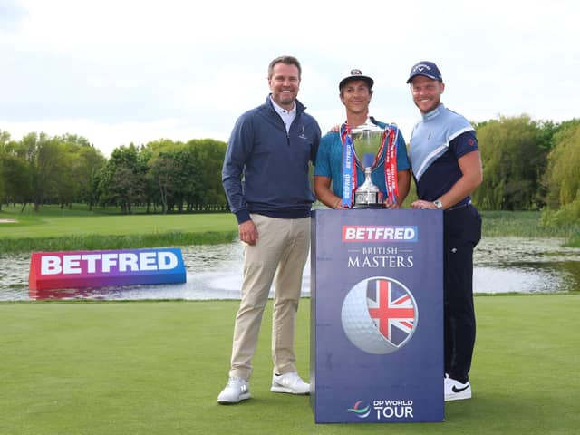 Thorbjorn Olesen (centre) of Denmark poses after winning the Betfred British Masters hosted by Danny Willett (right) at The Belfry on May 08, 2022 in Sutton Coldfield, England. (Photo by Andrew Redington/Getty Images).
