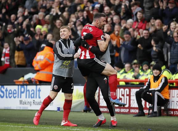 Enda Stevens celebrates his goal against Brighton and Hove Albion: Simon Bellis/Sportimage