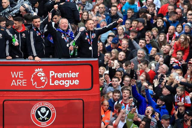 Chris Wilder and his Sheffield United players celebrating promotion to the Premier League with an open top bus parade around Sheffield city centre.  Danny Lawson/PA Wire.