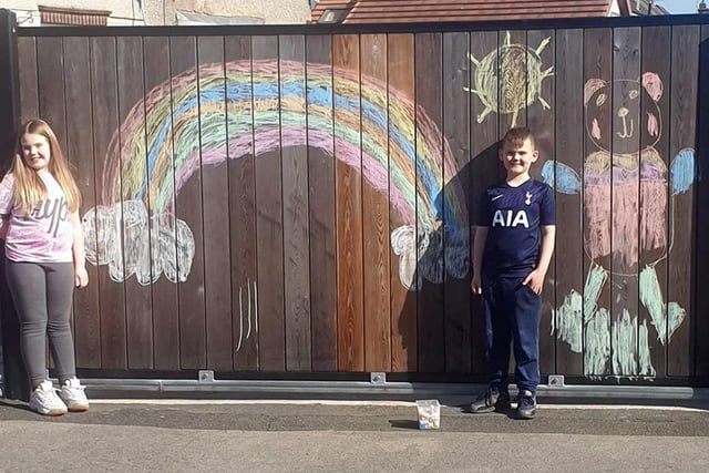 Mansfield rainbow pictures. 
Scarlett (7) and Zac (6) were worried people cant see our windows from the street so they drew it onto our gates for people walking past. Picture sent in by Zoe North.