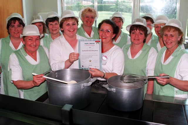 Meals staff at Hayfield School have met the criteria for the Doncaster Food and Health Challenge 1997. Pictured are the hard working staff with Christine Goodenough, catring manager(centre left)accepting the certificate from Norma Lauder, director of nutrition and Dietetics.