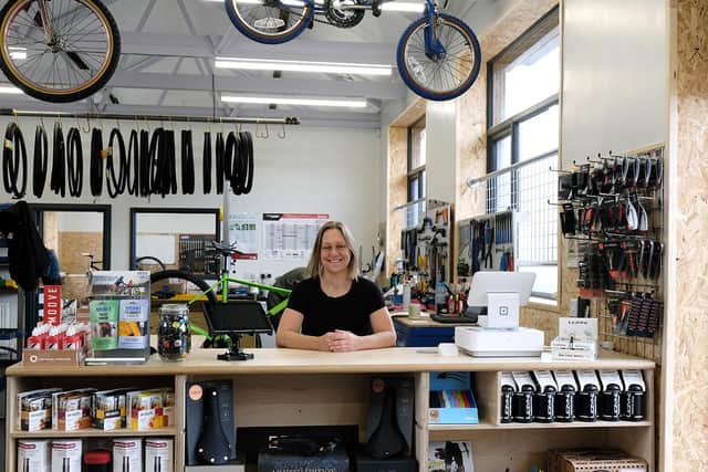 Sales manager Tori Gray behind the counter at A Different Gear, Heeley, Sheffield