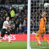 Derby County's Jack Marriott scores Derby's second goal of the game past Sheffield United goalkeeper Dean Henderson