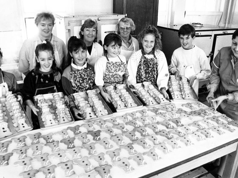 Pupils at Woodthorpe First and Middle School, Sheffield, at work making and decorating Pudsey biscuits with the help of the canteen staff in aid of the Children in Need Appeal, November 1989
