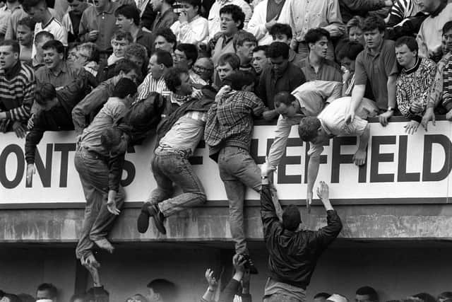 File photo dated 15/04/89 of Liverpool fans at Hillsborough, trying to escape severe overcrowding during the FA Cup semi-final football match between Liverpool and Nottingham Forest. . Photo: David Giles/PA Wire