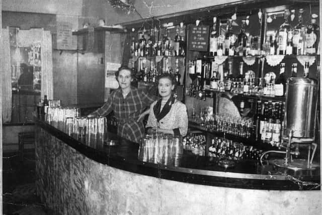 Harvey - now and then - Mrs Phoebe Williams and Mrs Peggy Bate behind the bar at the Attercliffe Palace, Sheffield, around 1950