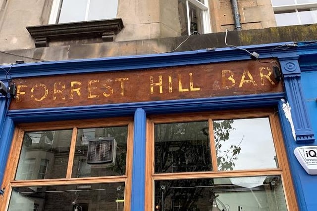 The old Forrest Hill Bar ghost sign uncovered during the refurb of Sandy Bell's pub.