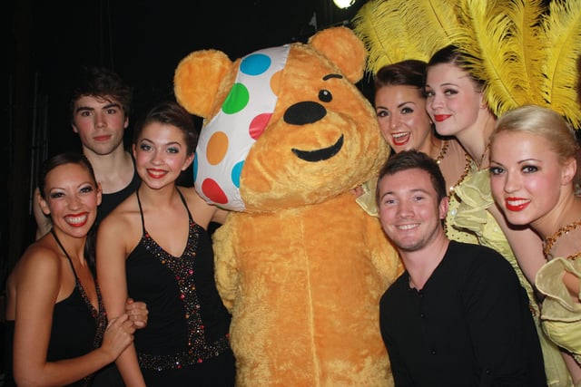 2011. Children in Need Variety Show at the Kings Theatre.
Lucy Kate Hoareau, Rob Robertson, Rosie Whitmore, Pudsey Bear, One half of Manic Stage Productions Co Founder and creative team Matt Newman, Lucy Smith, Rebecca Edwards and Amy Divine.