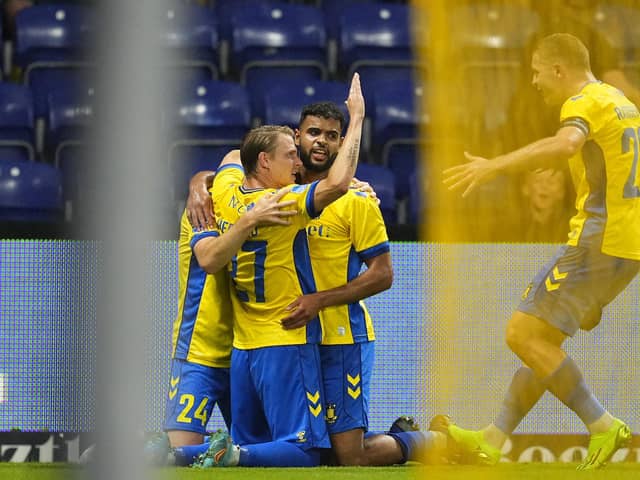 Brondby's Swedish forward Simon Hedlund (L) and Brondby's Tunisian midfielder Anis Ben Slimane (C) celebrate a goal during the UEFA Europa Conference League third qualifying round, first leg football match between Brondby IF and FC Basel at Brondby Stadium: CLAUS BECH/Ritzau Scanpix/AFP via Getty Images