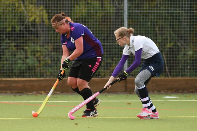 Nicky Puckett, left, netted four times in Portsmouth women's 3rds win over Gosport Borough. Picture: Neil Marshall