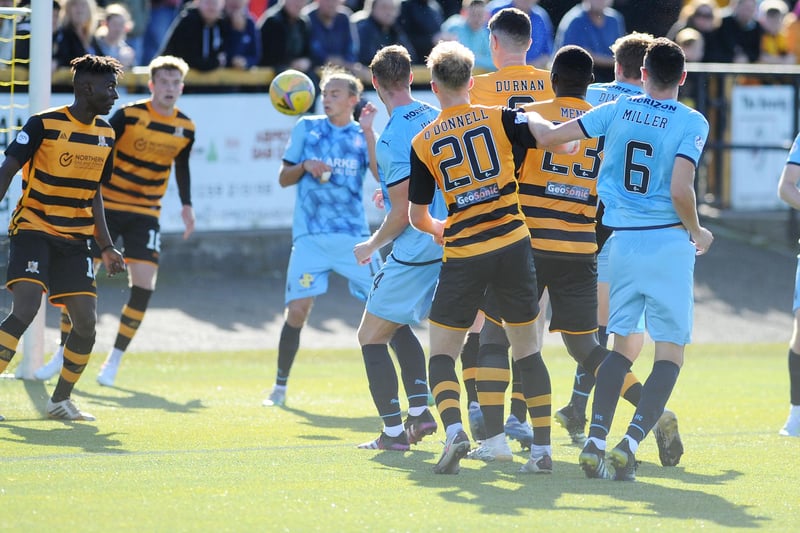 Falkirk's Paul Dixon sees his header cleared off the goal line by Alloa's defence