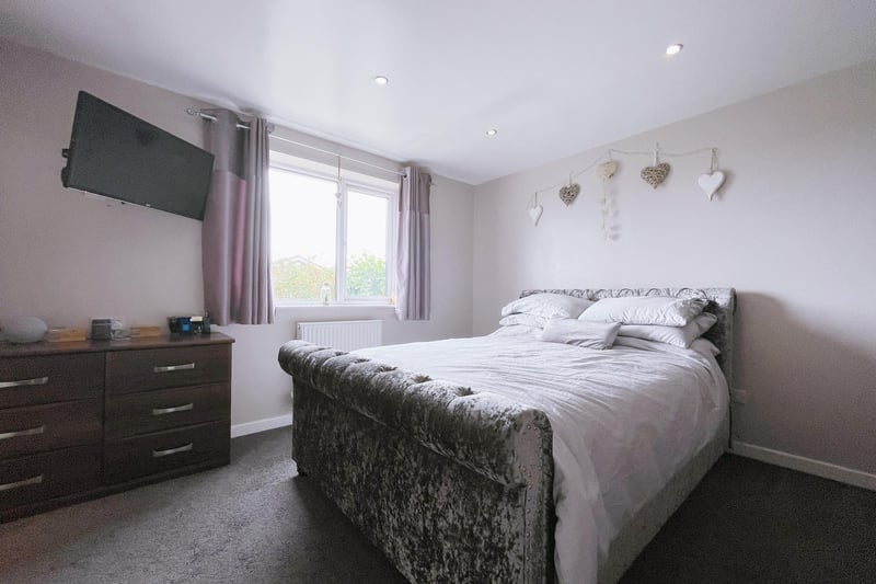 This double bedroom has fitted wardrobes and space for standing furniture.