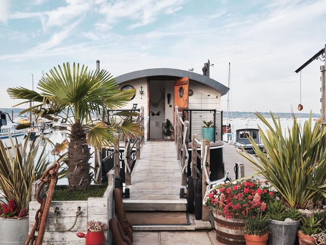 This converted coal barge in Gosport is up for sale