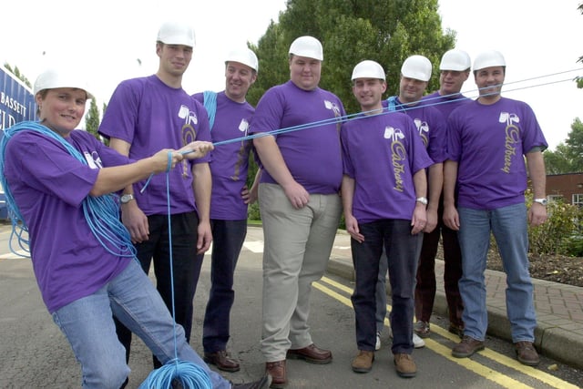 Cadbury Trebor Bassett employees were all set to take part in an abseil at Millers Dale in 2001.