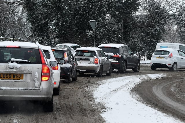 Traffic in the snow on Doncaster Road, Barnby Dun during the Beast from the East in 2018
