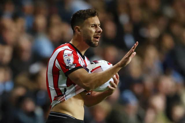 Sheffield United wing-back George Baldock is set to miss the game against Hull City due to injury: Darren Staples / Sportimage