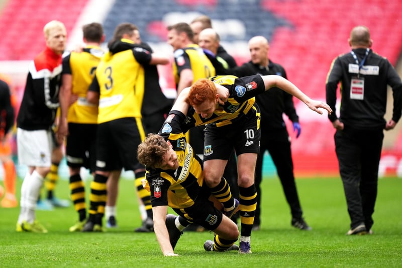 Hebburn Town's Robbie Spence (left) and Michael Richardson celebrate victory after the final whistle during the Buildbase FA Vase 2019/20 Final at Wembley Stadium, London.