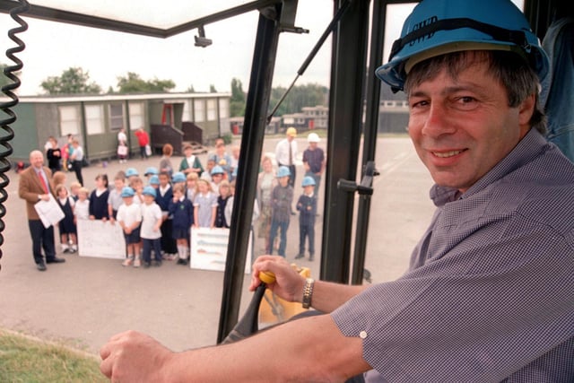 Birley Spa School headteacher Geoff Mawson pictured cutting the first sod on the  site of the new Birley School