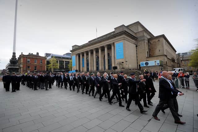 The parade leaves Sheffield City Hall.