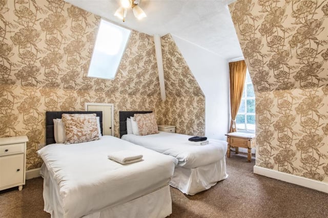 The second floor of Oakerthorpe Manor comprises two double bedrooms, both of which offer open views of the surrounding landscape and woodland. This is one of them.
