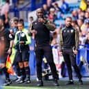 Sheffield Wednesday's Darren Moore is expecting a tough game against MK Dons.