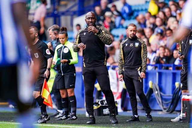 Sheffield Wednesday's Darren Moore is expecting a tough game against MK Dons.
