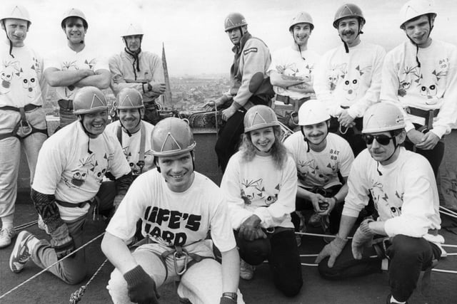 Gazette reporter Graham Simpson, front, with his fellow Comic Relief stuntmen and woman, ready to abseil off the 140ft high Wilkinson Court.