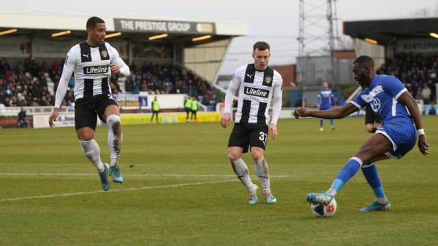 Hartlepool United's Gime Toure in action with Notts County's Callum Roberts and Richard Brindley  during the Vanarama National League match between Hartlepool United and Notts County at Victoria Park, Hartlepool on Saturday 22nd February 2020. (Credit: Mark Fletcher | MI News)