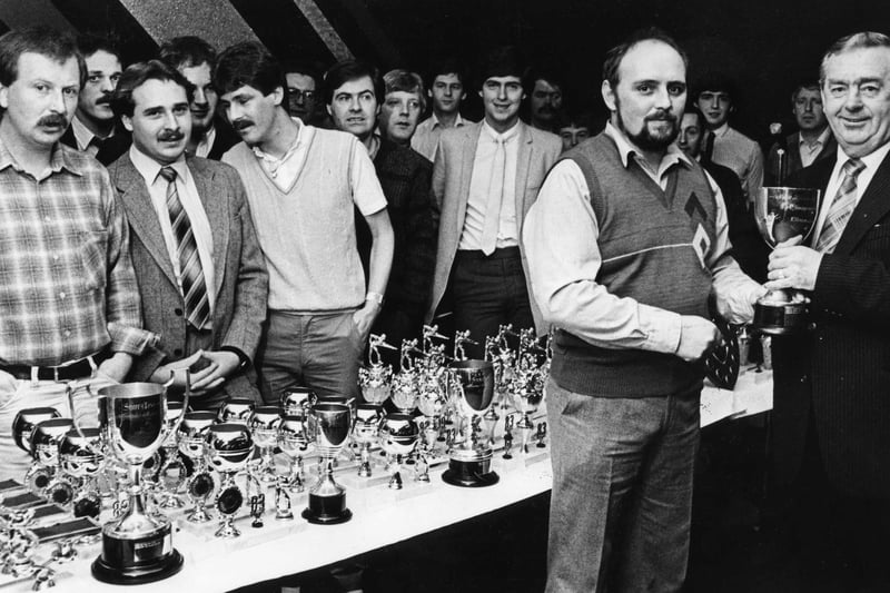Back to November 1983 where  Andrew O'Connor, right, of Bede Insurance Broker, Jarrow, presented Keith Johnston, captain of Boldon CA A team, with the First Division championship trophy at the South Tyneside Snooker League's annual presentation in Pelaw Social Club.