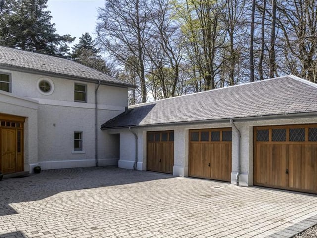 Courtyard and triple garage block.