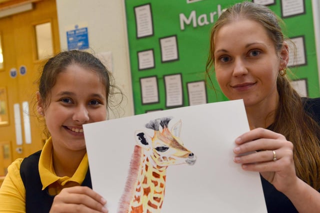 The school's art scheme for pupils and parents was in the news three years ago and here is Chloe Charlton, 10, with mother Danielle Charlton taking part in it.