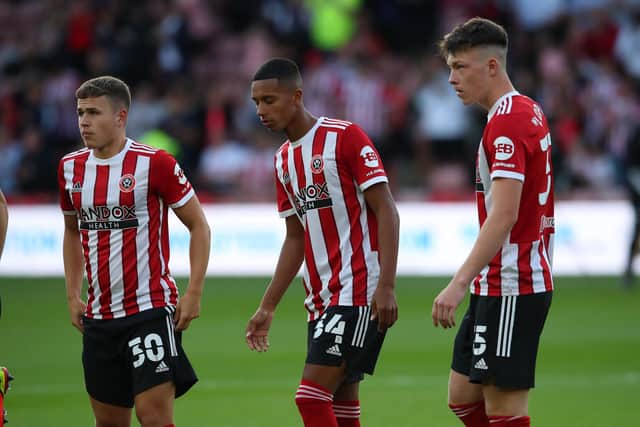 Zak Brunt, Kyron Gordon and Kacer Lopata during the Carabao Cup match at Bramall Lane: Simon Bellis / Sportimage