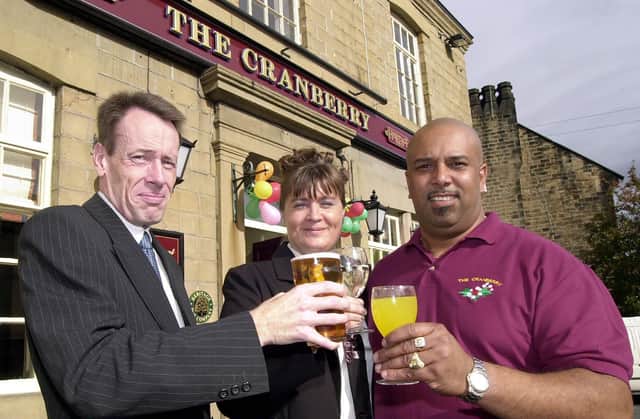 Reopening of the Cranberry Public House in 2003. Tennants Julie and and Steve Burton with Heritage Pub Company Business Develoment Manager Mark Pass