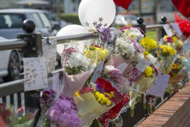 A sea of floral tributes was left at the crash scene
