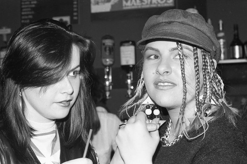 Two women at Maestro's in Glasgow around 1985 - one of the clubs with the strictest door policy around. The club channelled a different 1980s atmosphere with alternative fashion and sounds championed.  PIC: Photo by Simon Clegg.