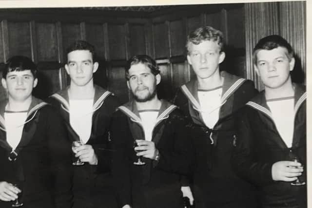 John Galway (right) with fellow HMS Sheffield crew members