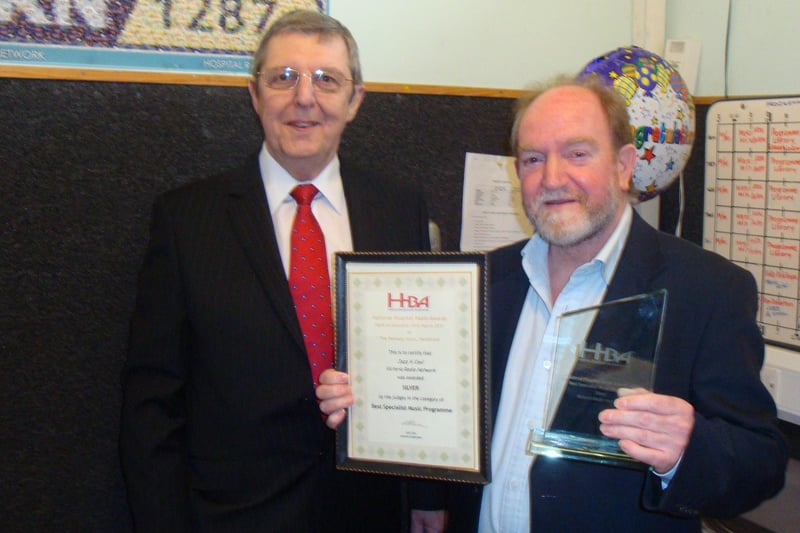 Ron Robertson  from Markinch with his Silver Award for his programme Jazz ‘N’ Cool.   Scottish Representative Jim Simpson personally presented the award at the Kirkcaldy studios.  Ron’s weekly jazz based programme was judged to be among the top three in the UK.