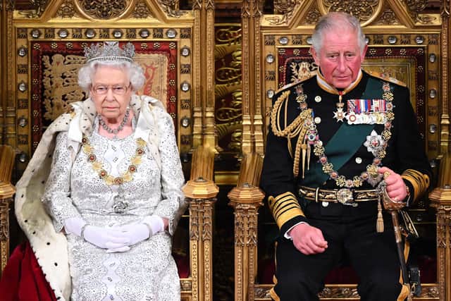 Queen Elizabeth II and Prince Charles, Prince of Wales during the State Opening of Parliament at the Palace of Westminster on October 14, 2019 in London, England. (Photo by Paul Edwards  - WPA Pool/Getty Images)