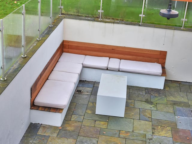 From the games/ cinema room is a sunken terrace.