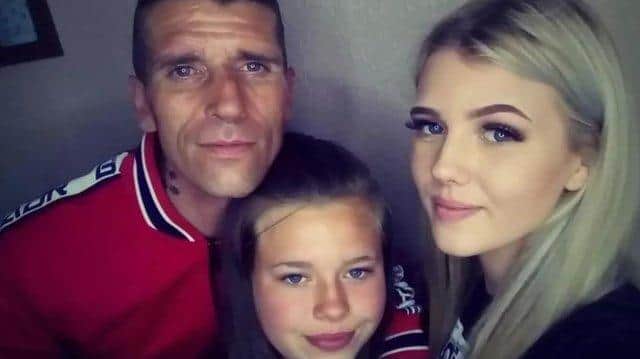 Lee with his daughters, Corrina and Jodi