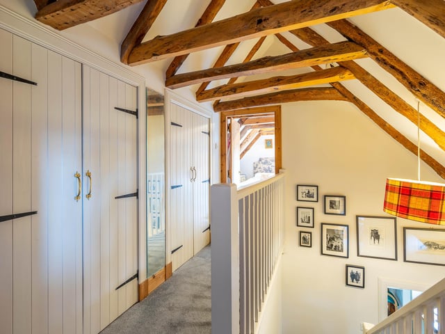 Theupstairs landing benefits from useful storage space