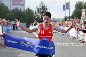 Andrew Heyes crosses the line in the 2021 Sheffield Half Marathon.