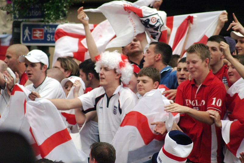 Do you recognise any familiar faces watching England play in the 2002 World Cup ?