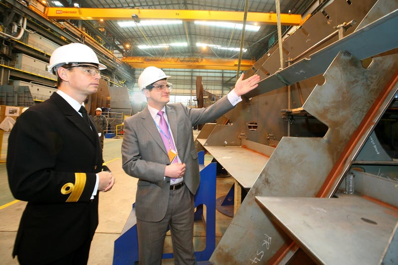 Francis Paonessa, managing director of VT Shipbuilding in Portsmouth (right), outlines details of the fourth and latest Type 45 destroyer to the new naval base commander, Commodore David Steel. 
Cdre Steel helped lower a strengthening beam onto the structure in the photo (which will be part of the ship's fresh water production plant room) as construction of HMS Dragon gets underway in Portsmouth.