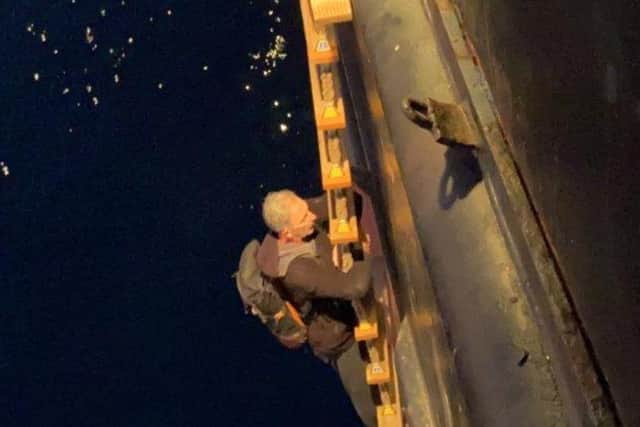 South Yorkshire writer Chris Pearsall was rescued after his yacht sank in the Mediterranean Sea. Picture shows his him climbing onto the Ukranian cargo ship which rescued him
