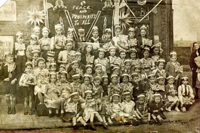VE Day outside Mrs Gamble's shop in Bromley Street, Sheffield, opposite The Ponderosa. Submitted by Michael Lowe