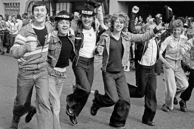 Flares and 'kiss me quick' hats for these visitors to the 1977 Miners Gala.