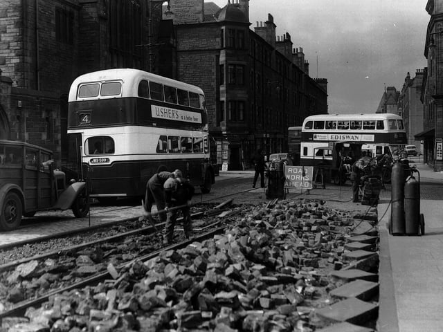 Tram rails being removed in Slateford Road near top of Robertson Avenue.